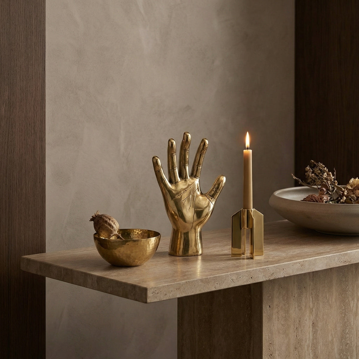Noir Open Hand Sculpture Antique Brass styled in an interior setting
