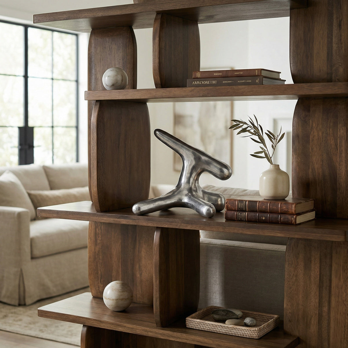 Noir Wiggins Sculpture Brushed Silver styled in an interior setting