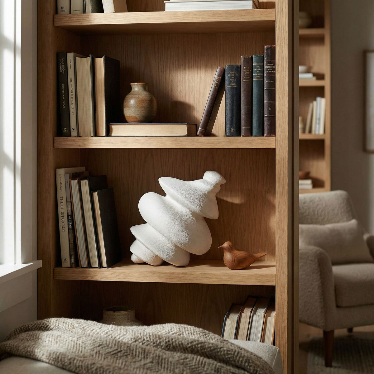 Noir Spiral Sculpture White styled in an interior setting