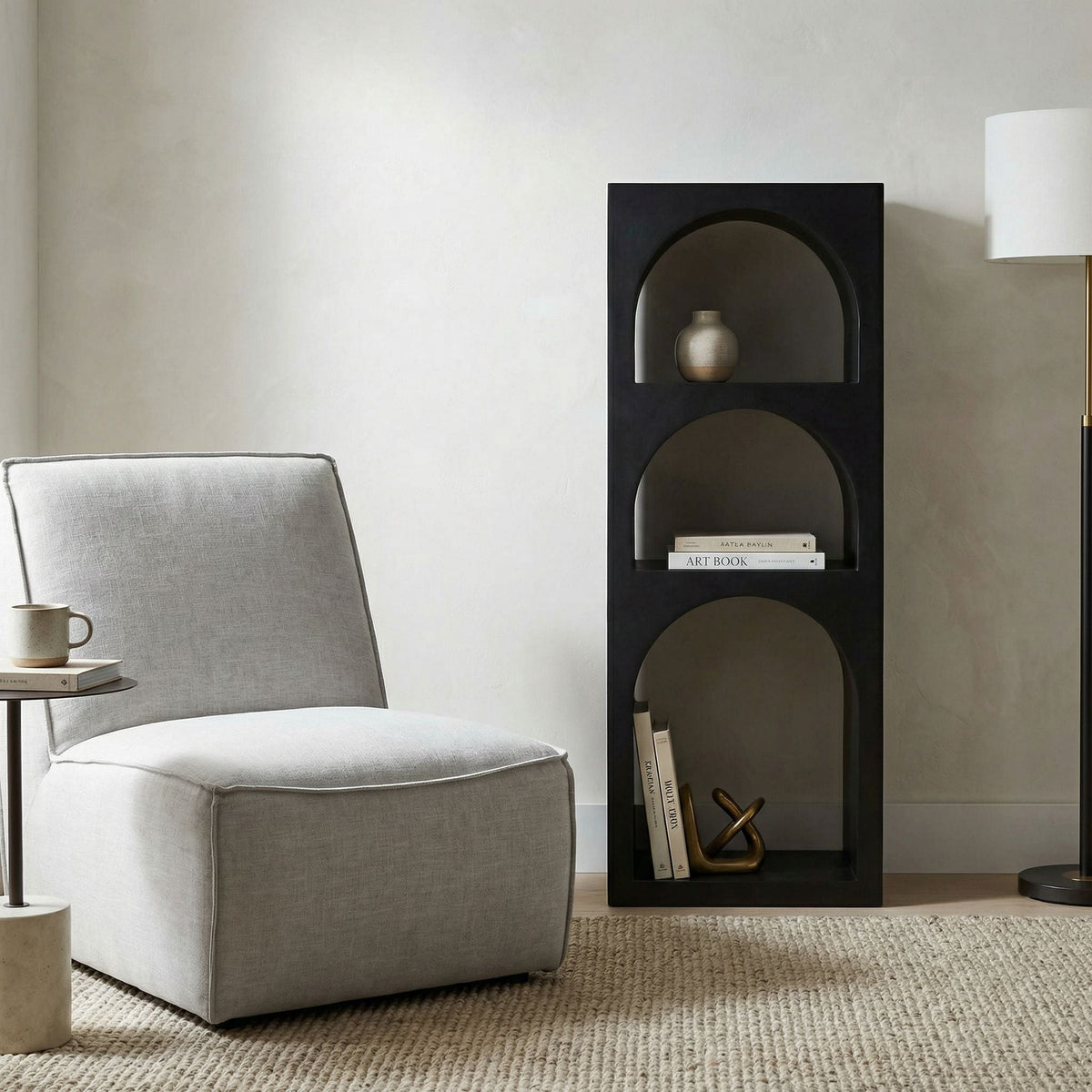 Noir Aqueduct Bookcase Black Metal styled in an interior setting