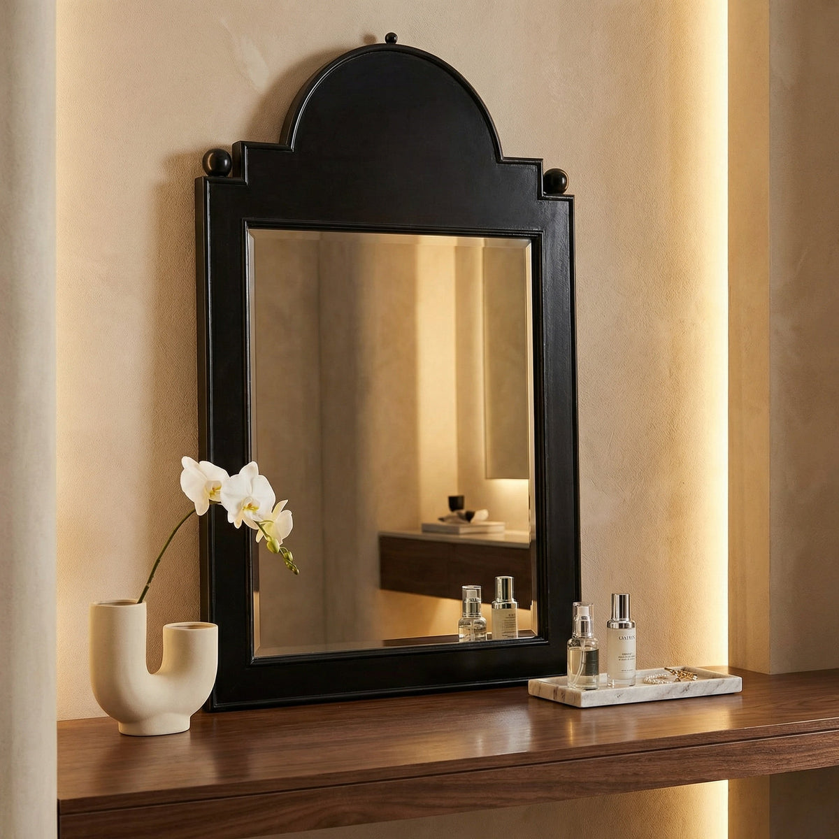 Noir Jess Mirror Hand Rubbed Black shown in a styled room setting