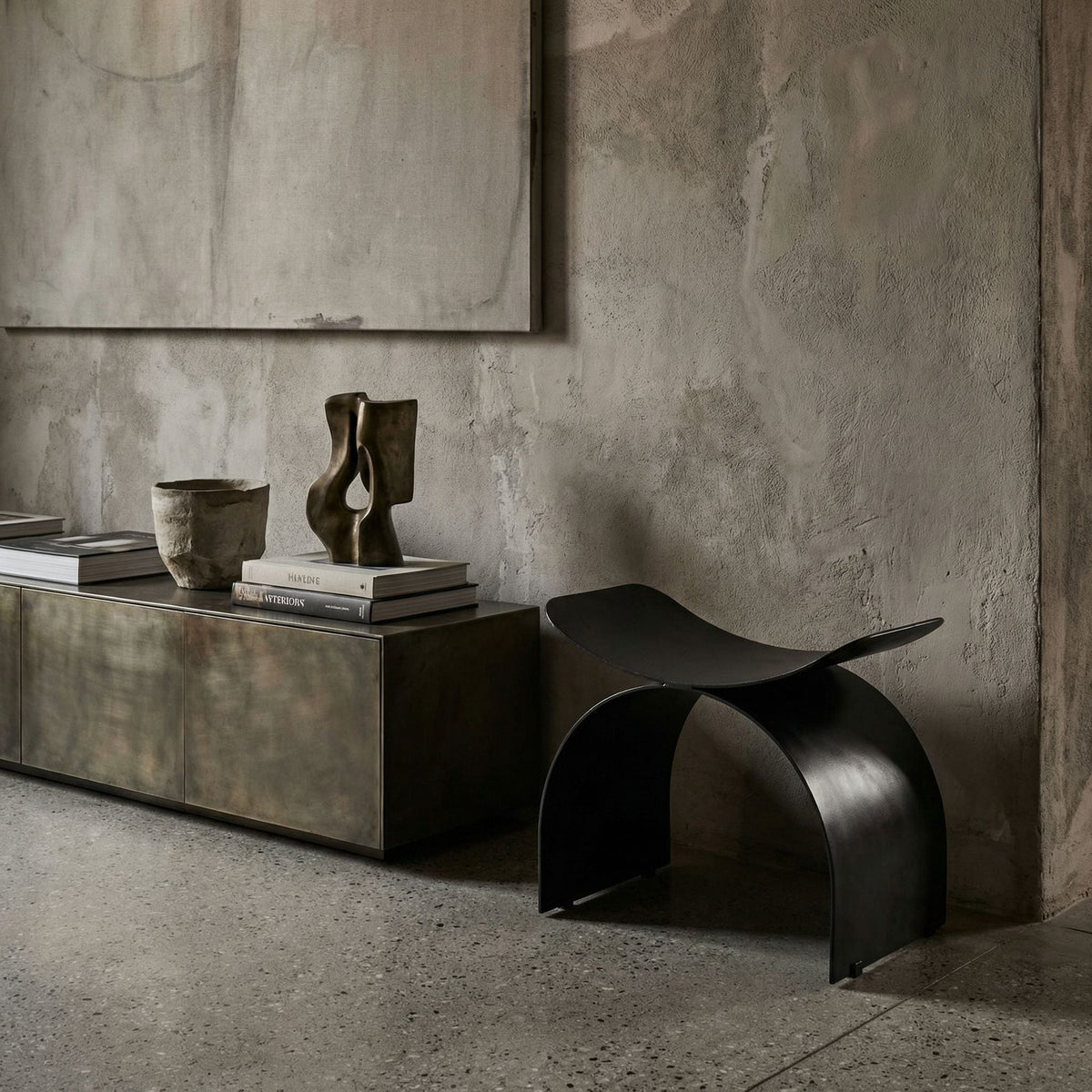 Noir Papillon Stool Matte Black styled in an interior setting