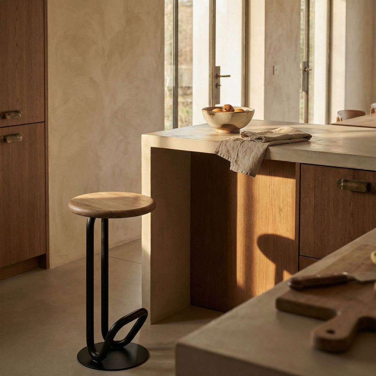 Noir Hook Counter Stool Matte Black styled in an interior setting