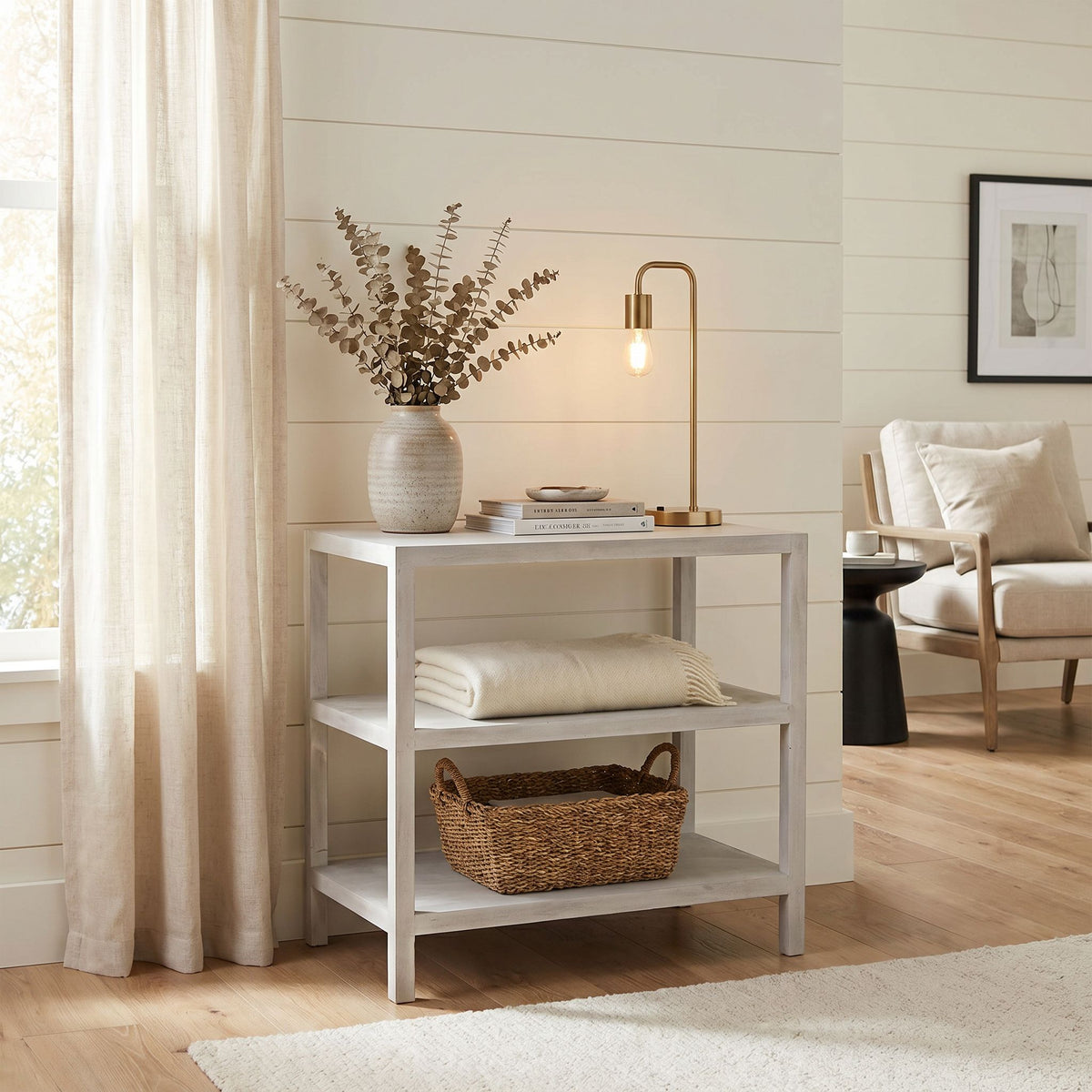 Noir 2-Shelf Side Table White Wash shown in a styled room setting