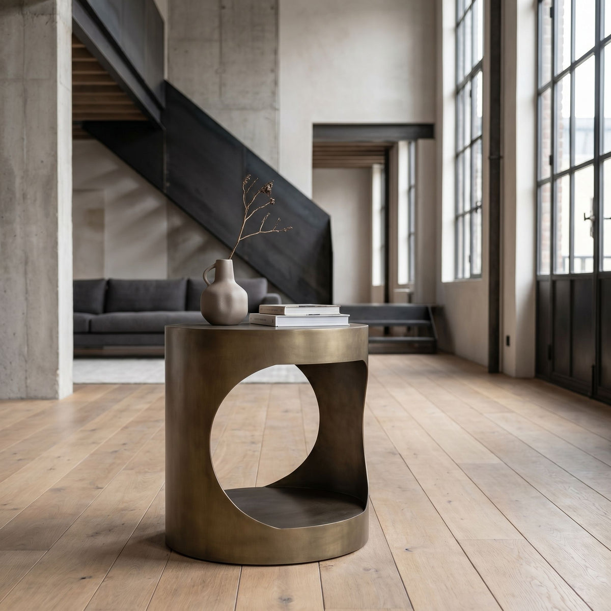 Noir Eclipse Side Table Aged Brass styled in an interior setting