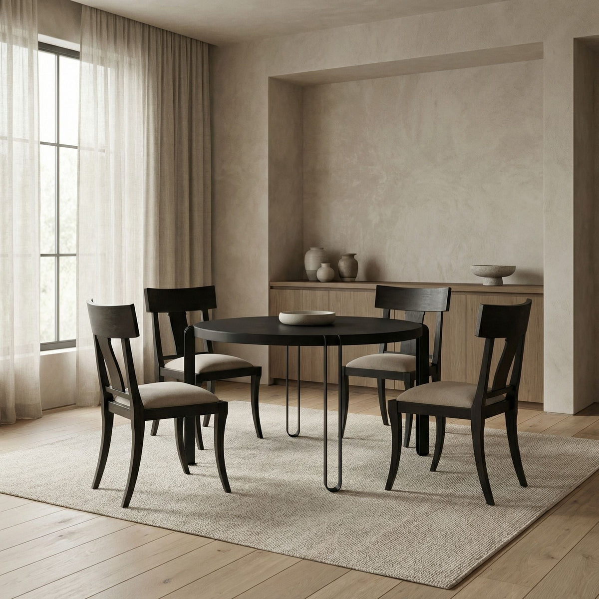 Noir Marcellus Dining Table Black styled in an interior setting