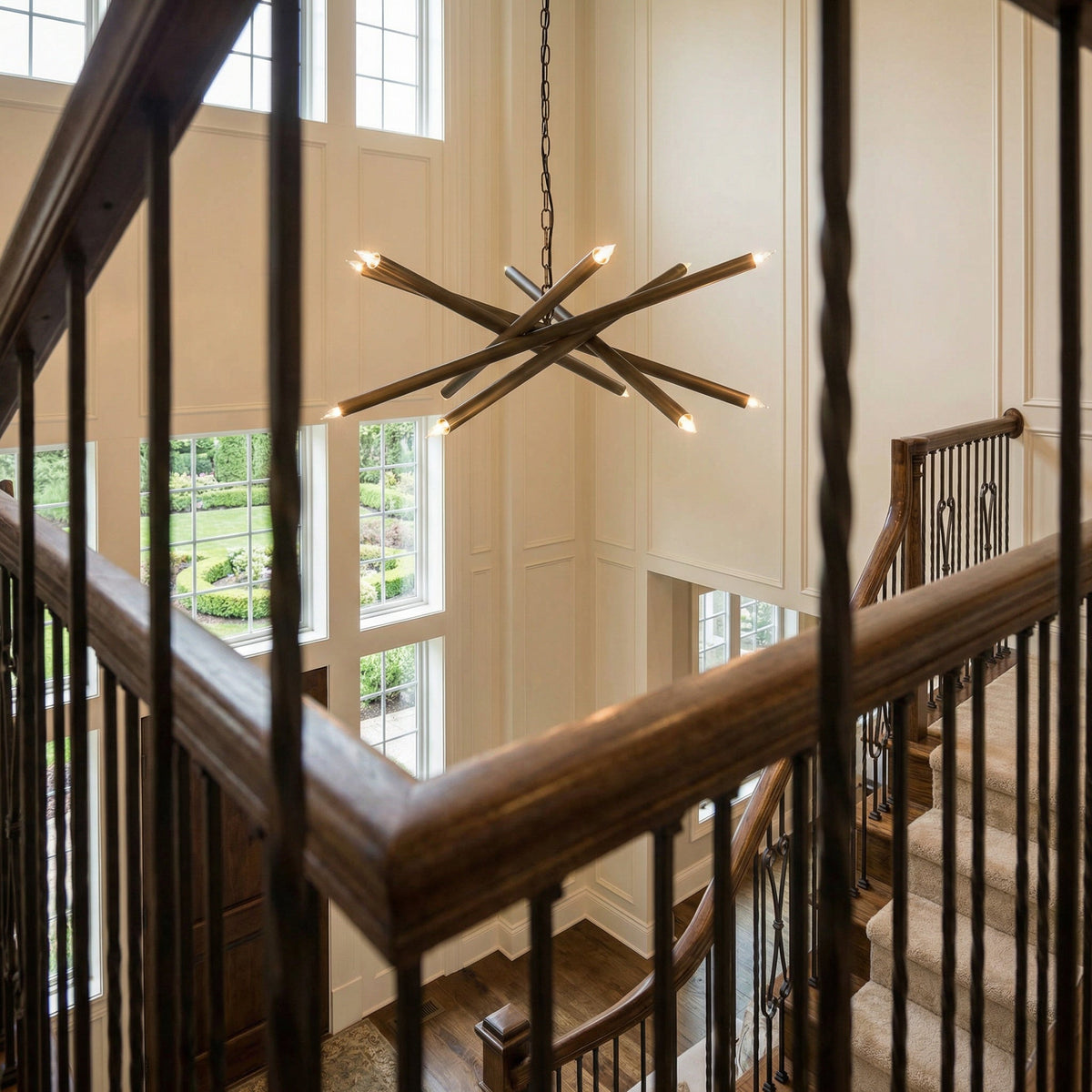 Noir Ikram Chandelier 12-Light Antique Brass styled in an interior setting