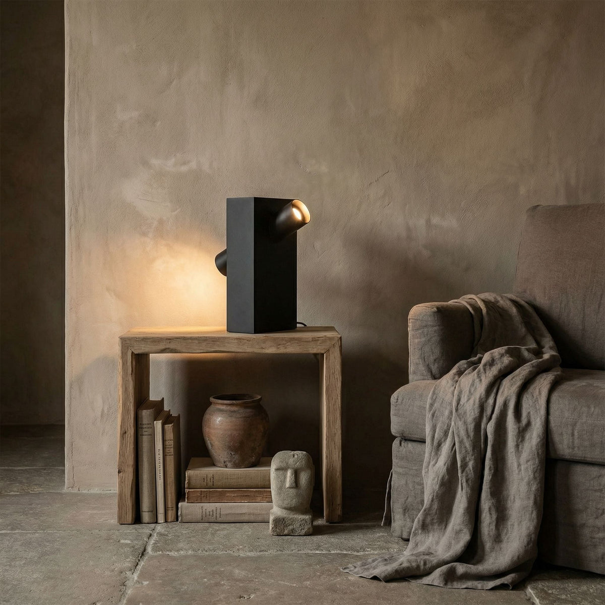 Noir Topo Table Lamp Matte Black styled in an interior setting