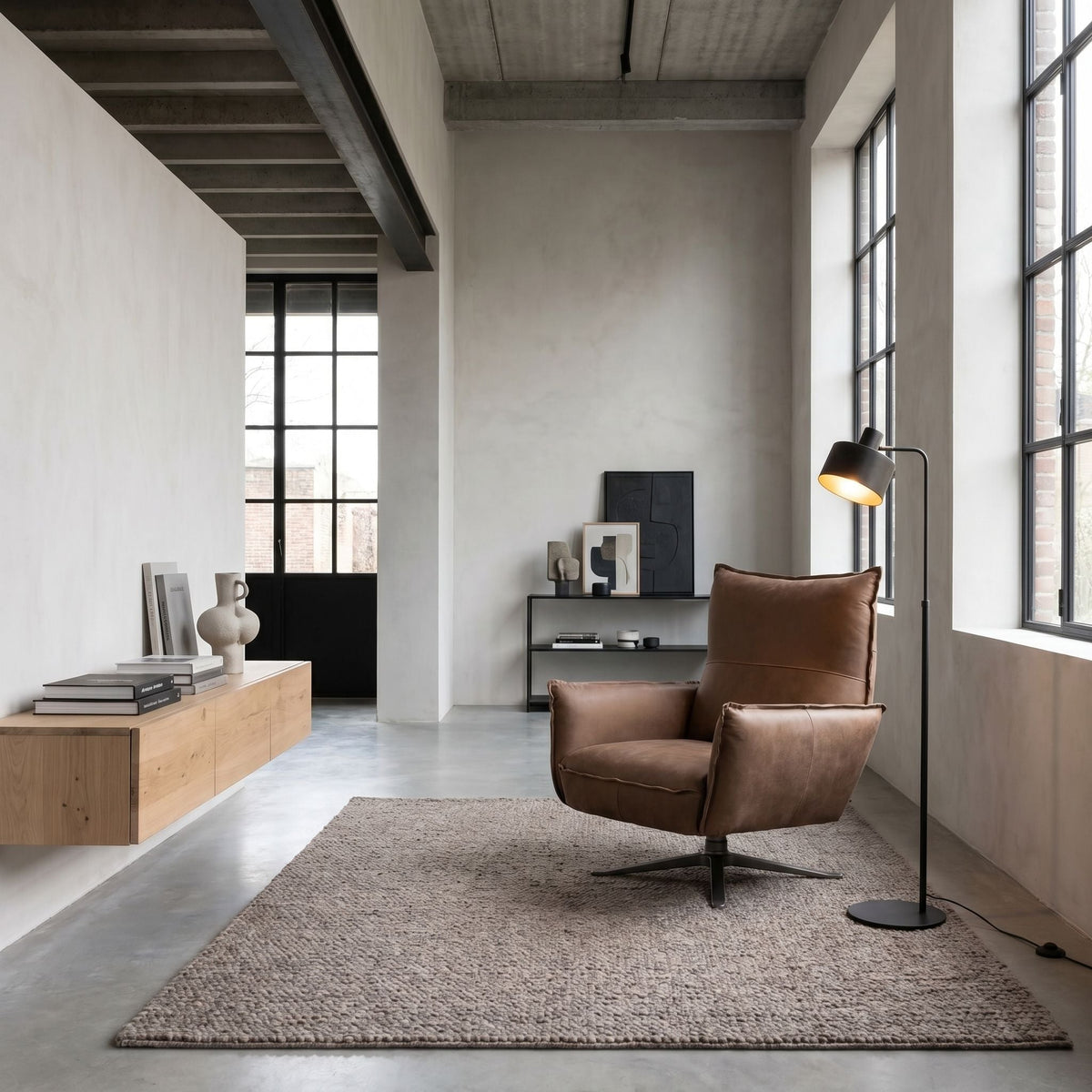 Noir Lawrenceville Swivel Chair Brown Leather styled in an interior setting