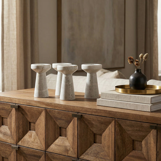 Noir Aleka Decorative Candle Holder Waxed White styled in an interior setting