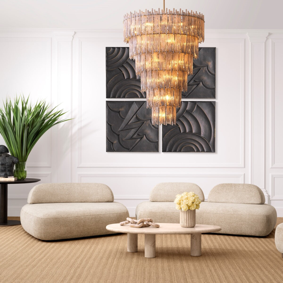 Sofa Residenza featured in a grand sitting room alongside a statement chandelier, a coffee table, and curated wall art.