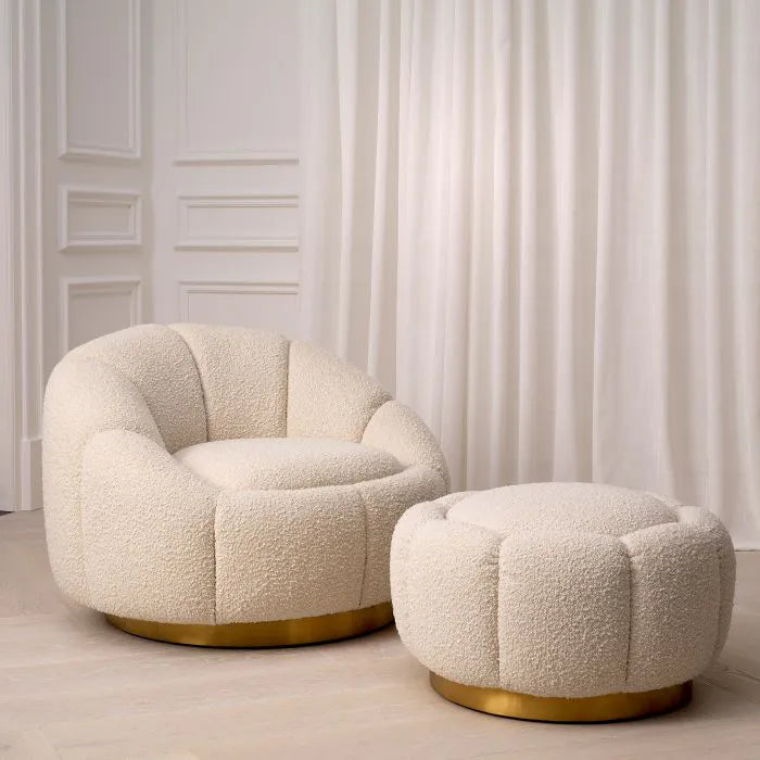 Inger Ottman styled in front of the Inger Swivel Chair in a Boucle Cream Fabric.