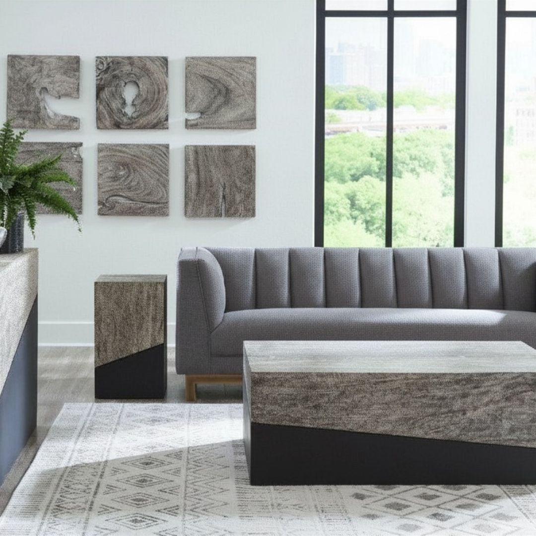 Geometry Small Coffee Table in a graystone and black finish styled within a modern organic sitting room.