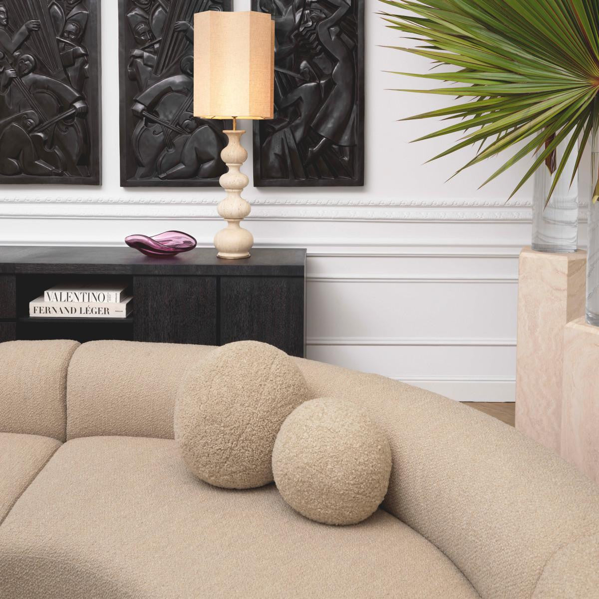 Palla Pillows styled on a contemporary sofa in a grand sitting room.