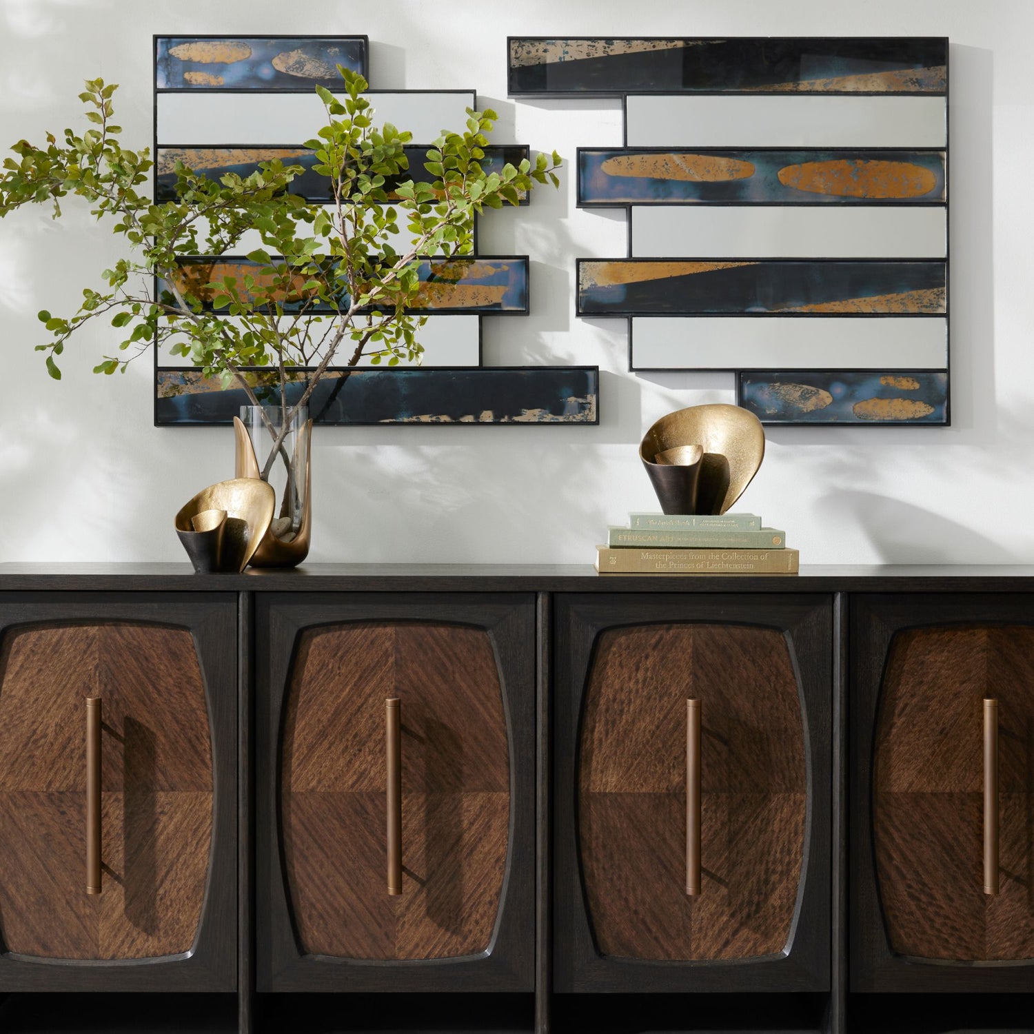 Elmore Credenza styled with artwork displayed above and decorative accents arranged on top.