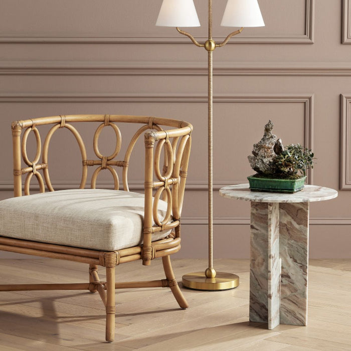 Tegal Natural Chair styled beside an occasional side table, with a floor lamp positioned behind it.