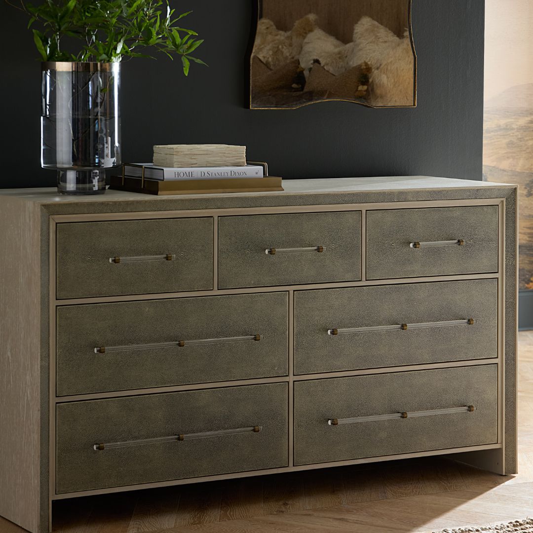 Alford Chest with decorative books and a glass vase with greenery styled on top.