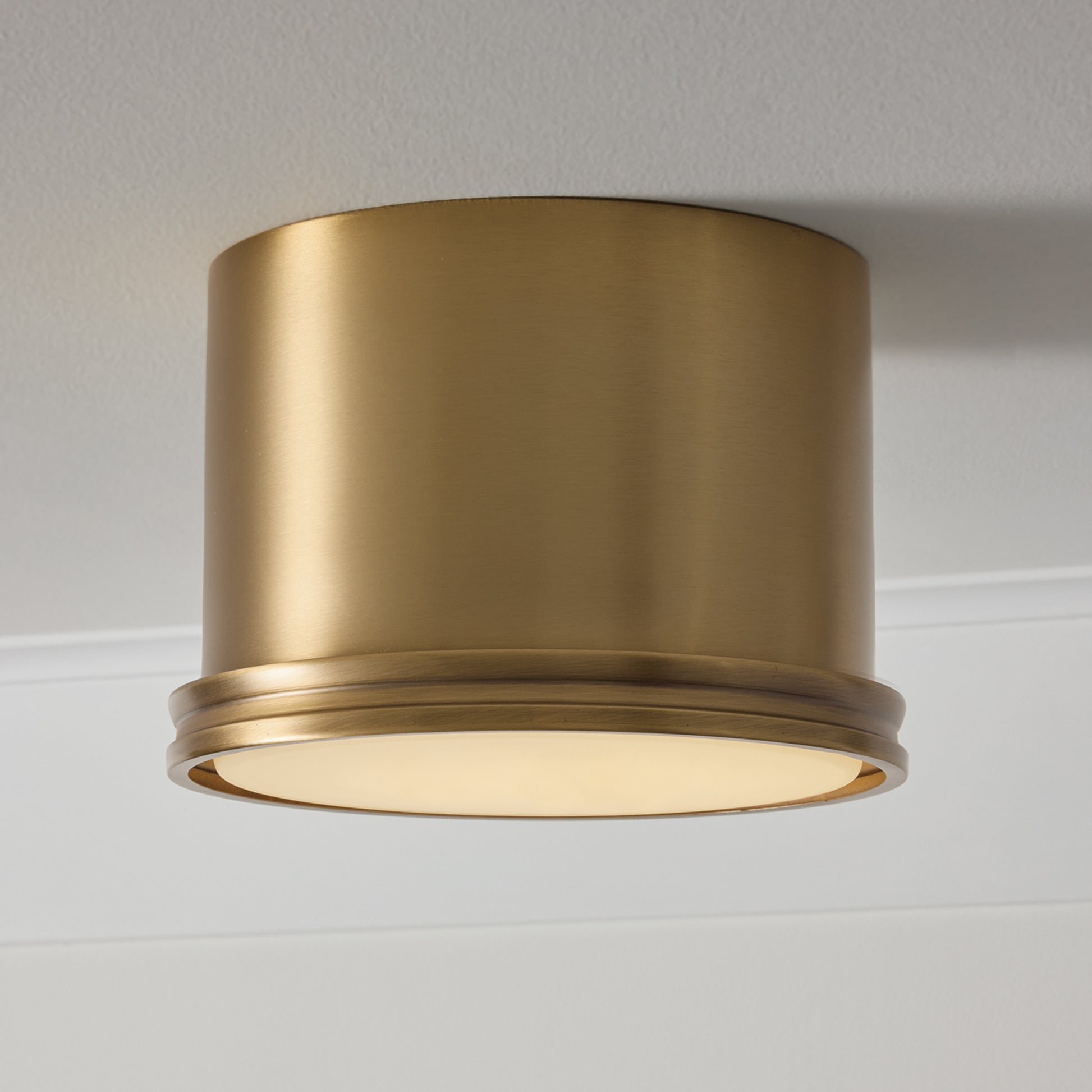 Capital Griffin Flush Mount in Aged Brass