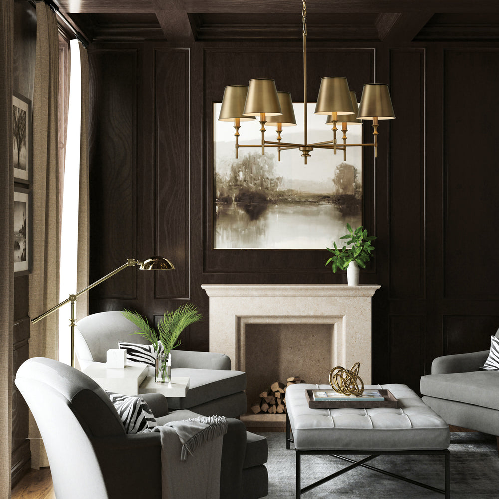 Luxurious living room with dark wood paneling, a fireplace, transitional chandelier, and modern decor.