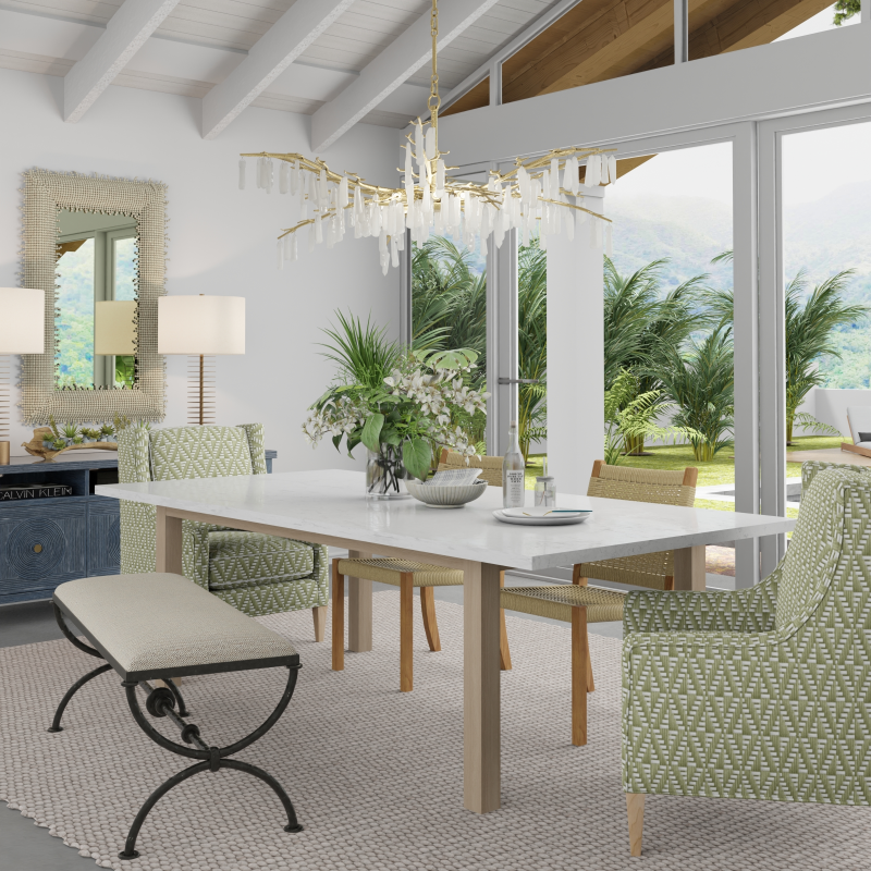 Transitional dining room with a large window view of greenery with a whimsical chandelier styled above the table.