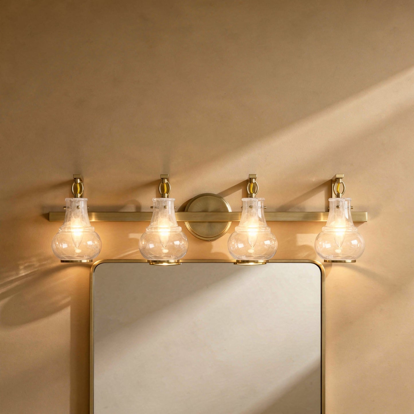 Adams 4-Light Bathroom Vanity Light in Warm Brass