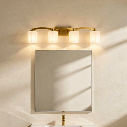 Whitney 4-Light Bathroom Vanity Light in Warm Brass