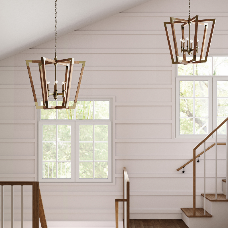 Staircase with wooden railings and pendant lights in a well-lit room with large windows.