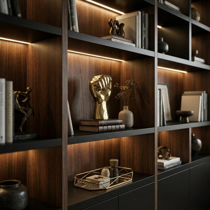 Noir The Solidarity Fist Sculpture Antique Brass styled in an interior setting