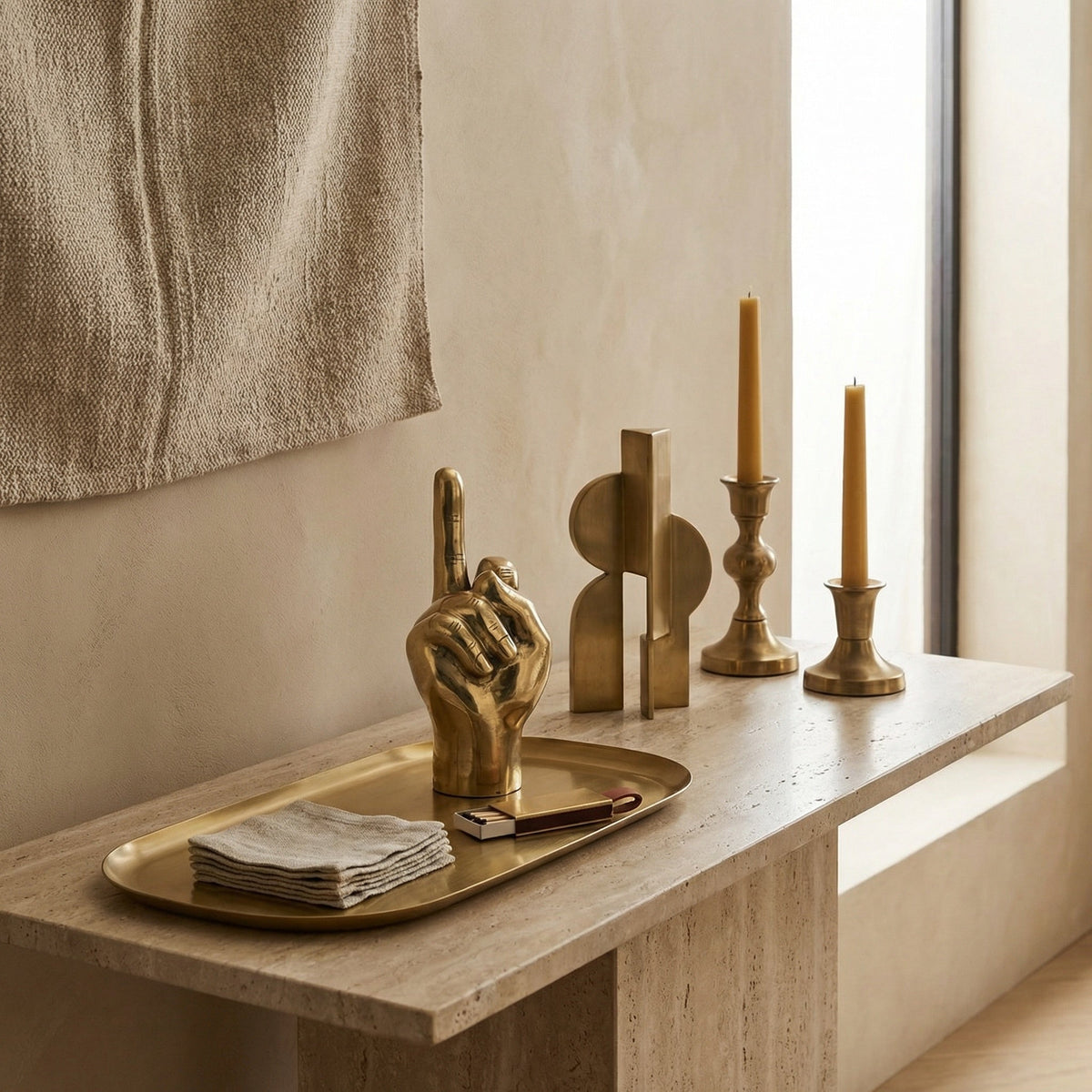 Noir The Finger Sculpture Antique Brass styled in an interior setting