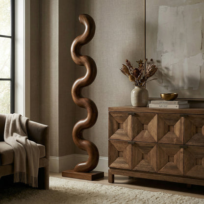 Noir Asclepius Sculpture Dark Walnut styled in an interior setting