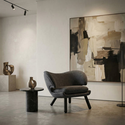 Noir Valerie Lounge Chair Black Charcoal, Ocean Gray styled in an interior setting