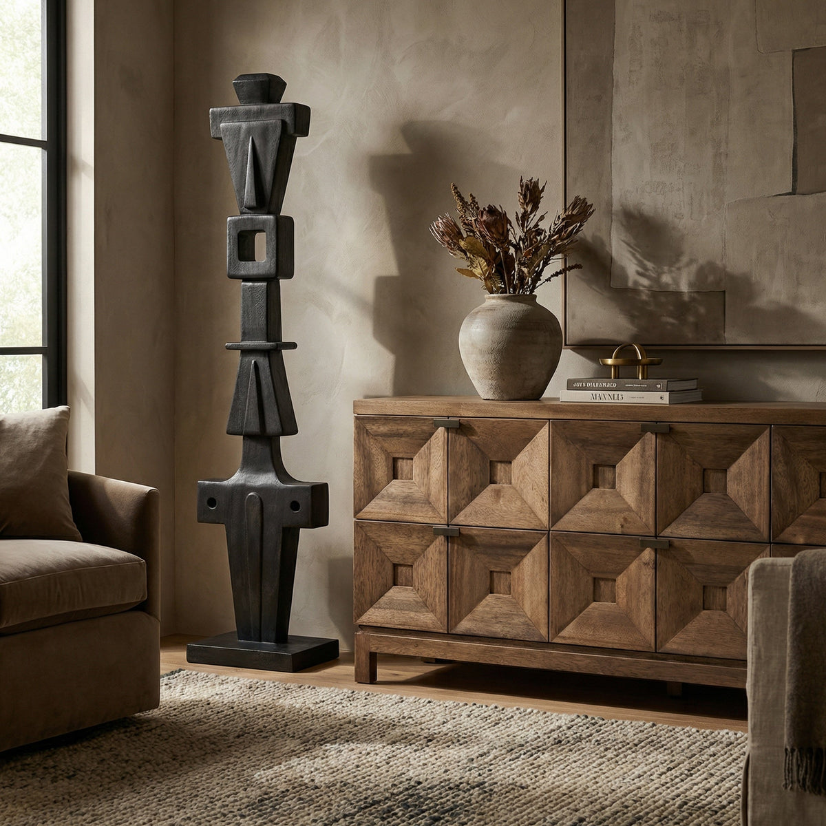 Noir Brutus Statue Burnt Black styled in an interior setting