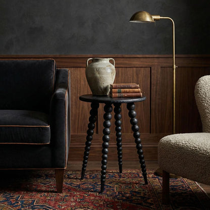 Noir Rebecca Side Table Cinder Black styled in an interior setting