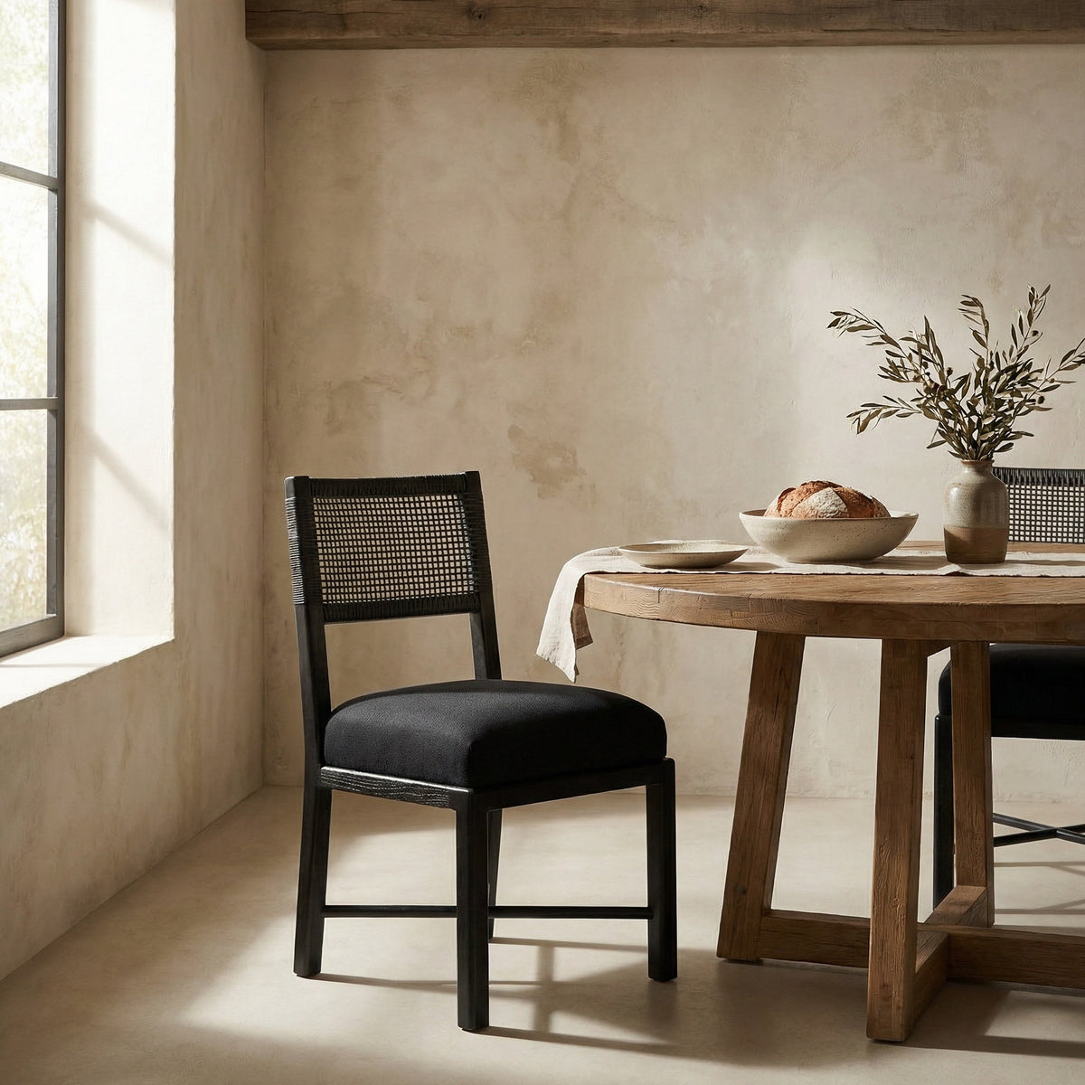 Noir Lobos Dining Chair Black Charcoal, Black styled in an interior setting