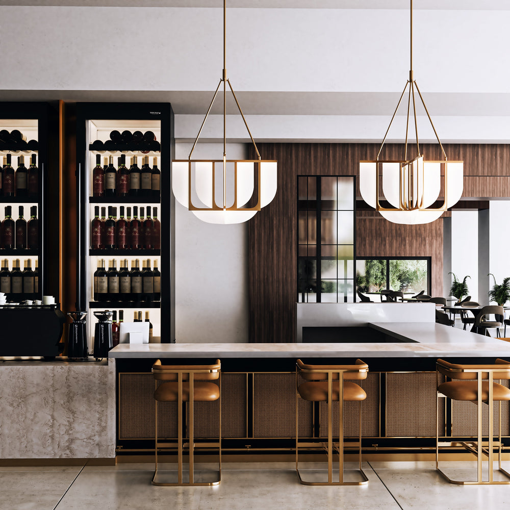 Modern kitchen with island, bar stools, Two Anders Pendants styled above the island, and wine rack.