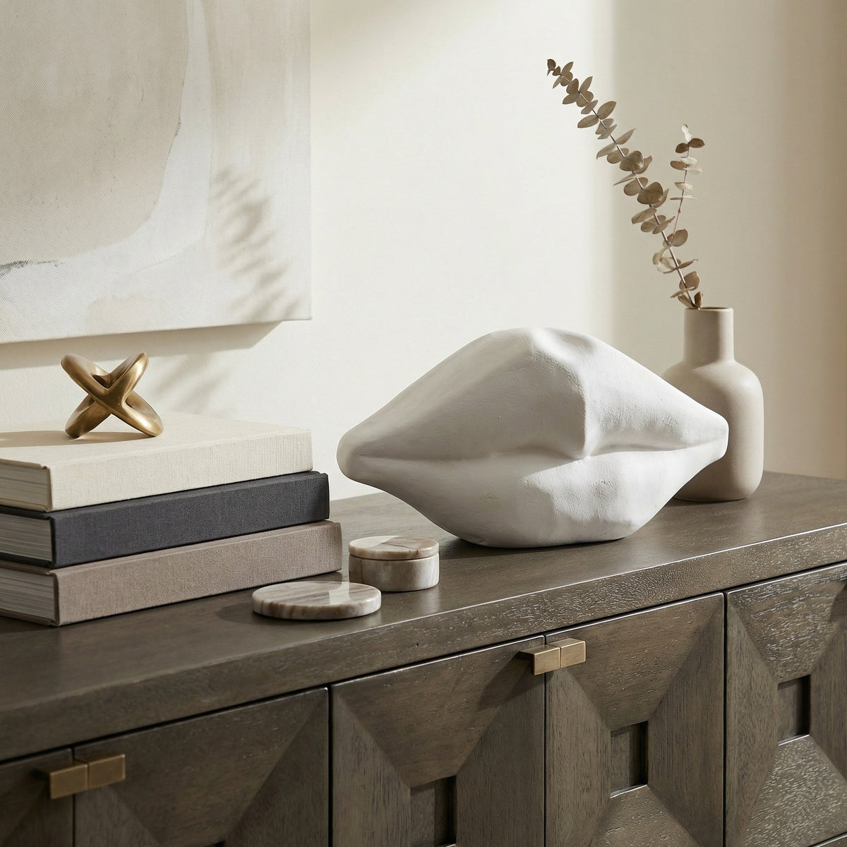 Noir Lips Sculpture White styled in an interior setting