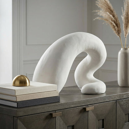 Noir Fisnik Sculpture White styled in an interior setting