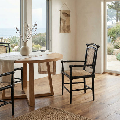 Noir Colonial Bamboo Arm Dining Chair Hand-Rubbed Black styled in an interior setting