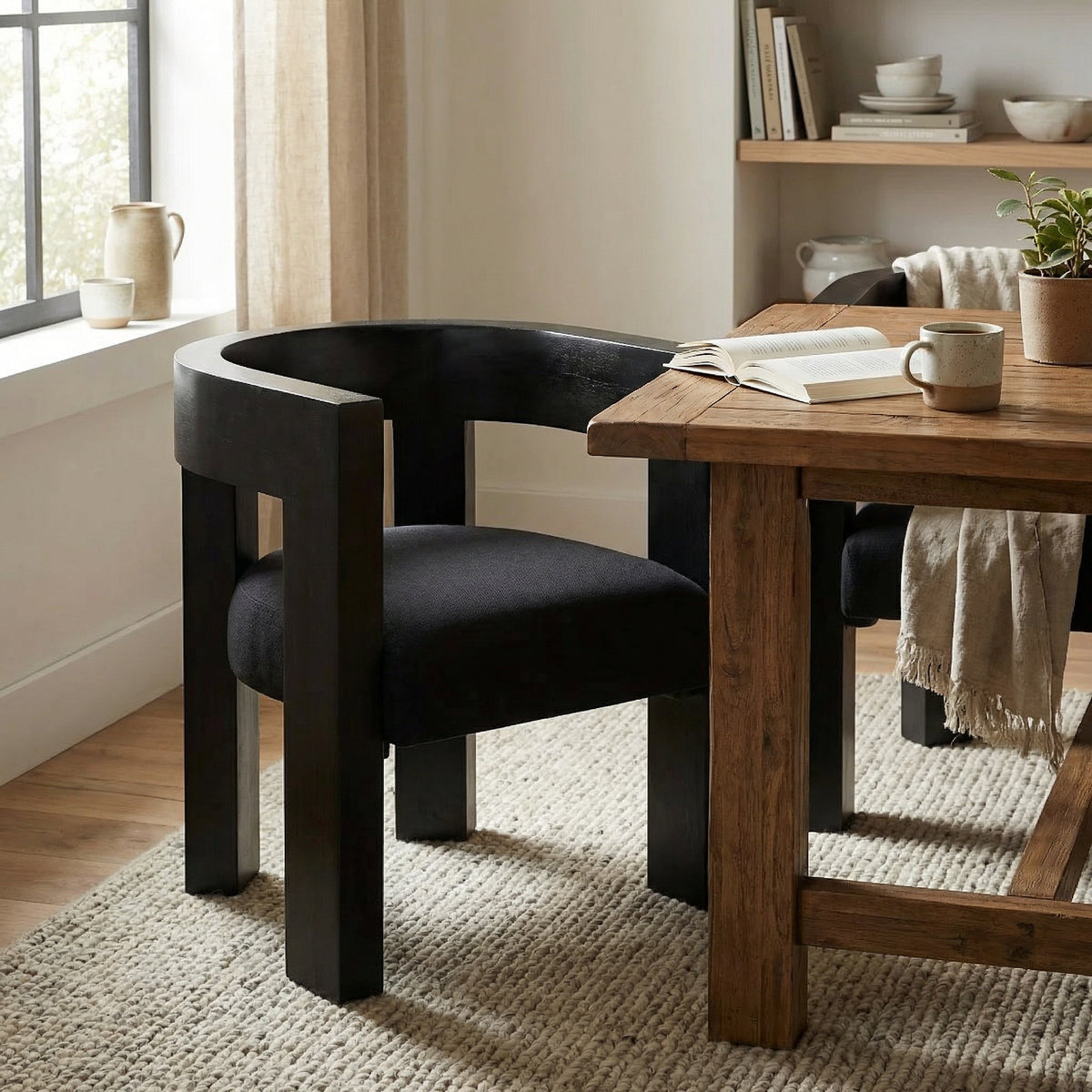 Noir Eros Dining Chair Hand-Rubbed Black, Black styled in an interior setting