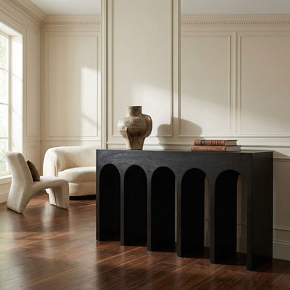 Noir Bridge Console Hand-Rubbed Black styled in an interior setting