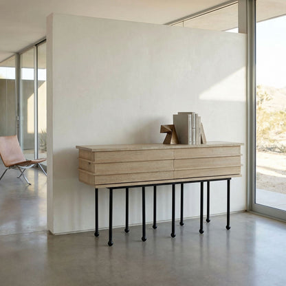 Noir Oliver Console Washed Walnut styled in an interior setting