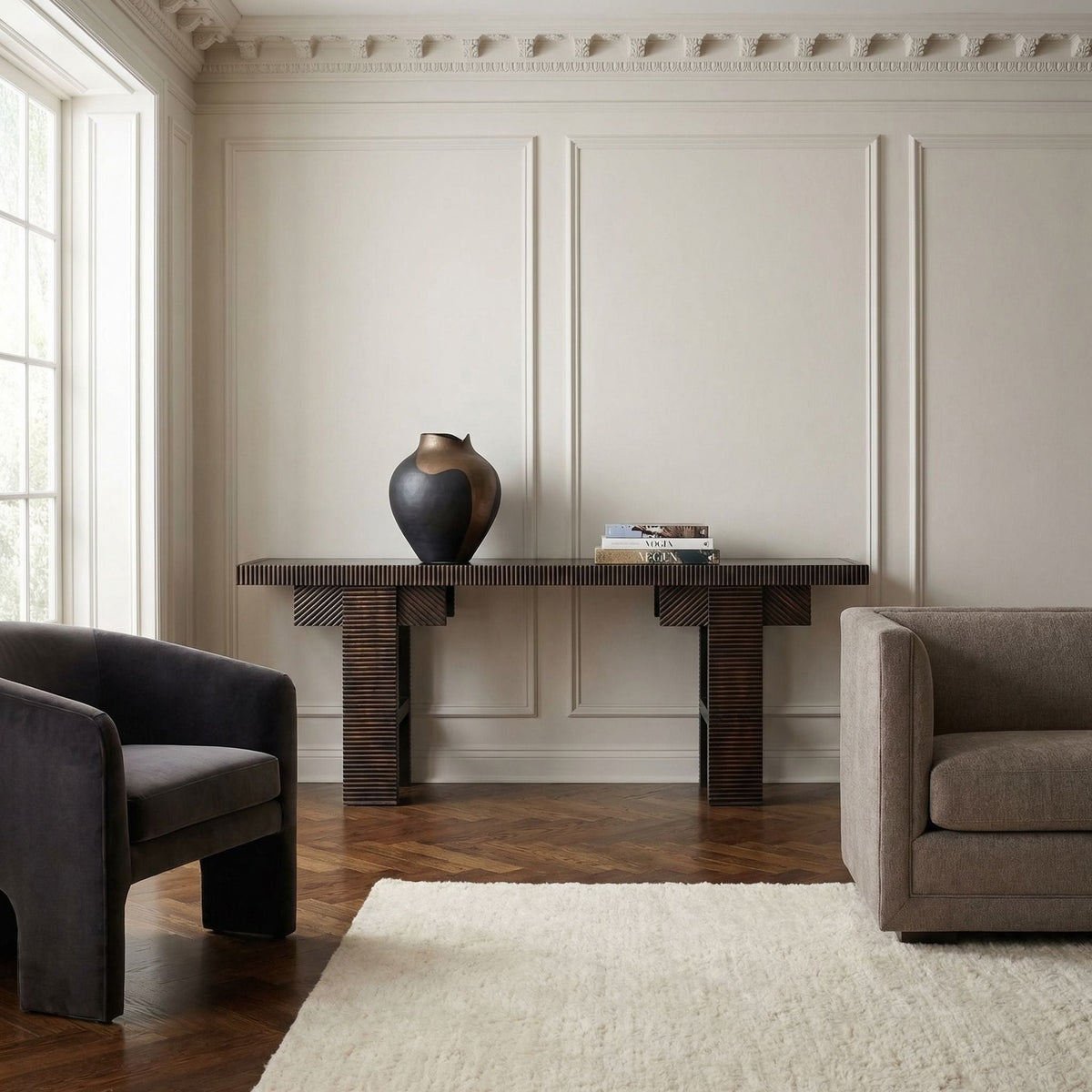 Noir Nabu Console Hand Rubbed Black with Light Brown Trim styled in an interior setting