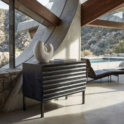 Noir Arturo Console Black Walnut styled in an interior setting