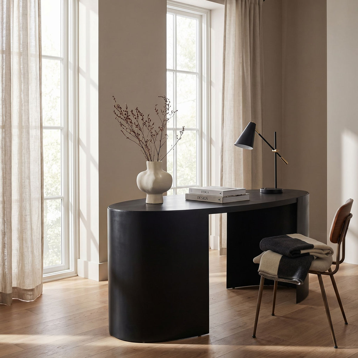 Noir Marigold Desk Ebony Walnut, Matte Black styled in an interior setting