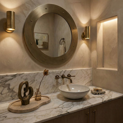 Noir Clay Mirror Antique Brass styled in an interior setting