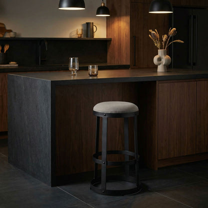 Noir Dior Bar Stool Matte Black, Tan styled in an interior setting