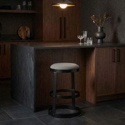 Noir Dior Counter Stool Matte Black, Tan styled in an interior setting