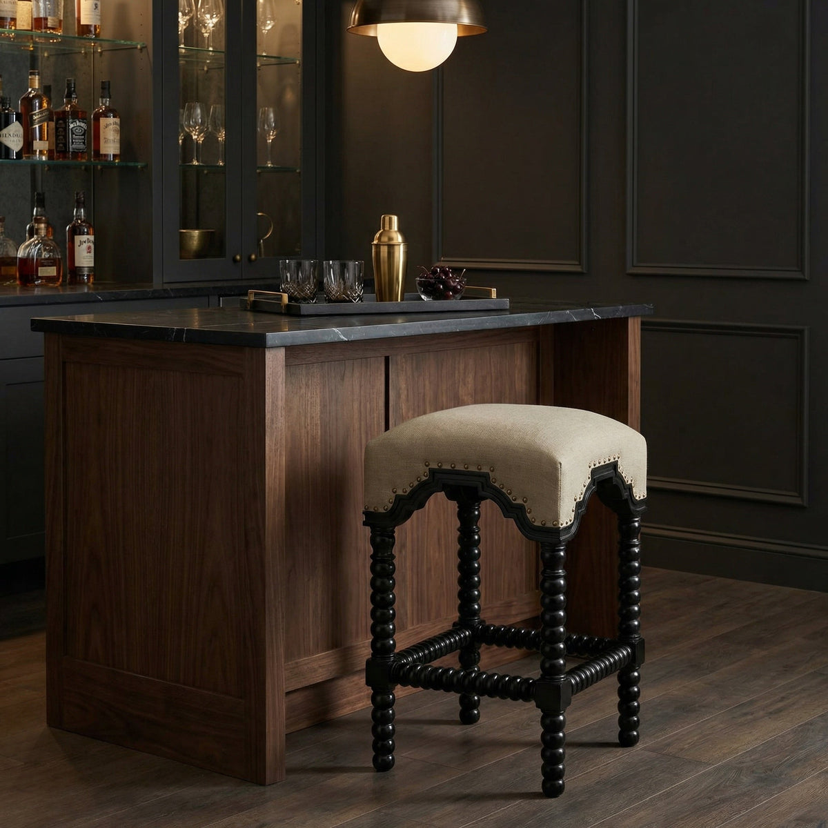 Noir Abacus Counter Stool Hand-Rubbed Black, Olive styled in an interior setting