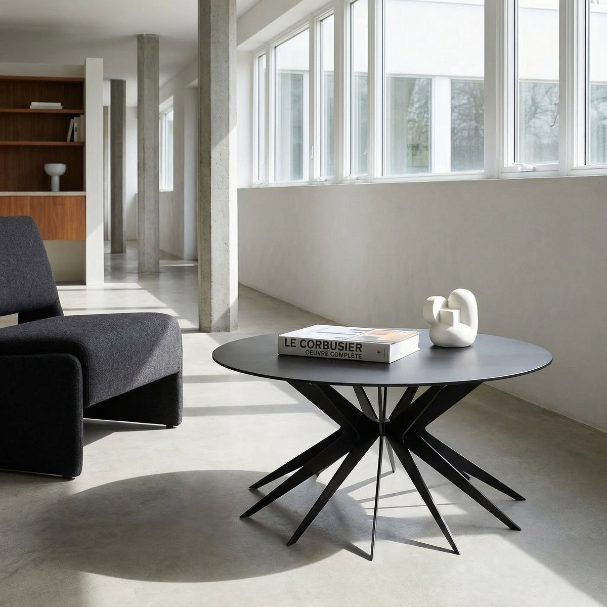 Noir Spider Coffee Table Matte Black styled in an interior setting