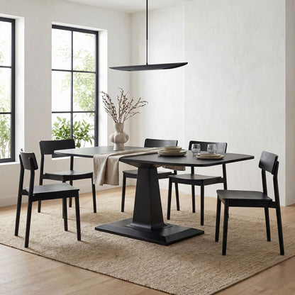 Noir Amboss Dining Table Matte Black styled in an interior setting